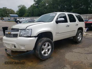2012 Chevrolet Tahoe LTZ with VIN 1GNSKCE08CR149468, listed as a Copart auction lot 55894075 with 226,532 mi miles and Salvage title. Bid and sale history available at DreamBid. Image 1.