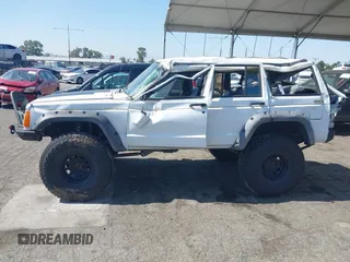 1991 Jeep Cherokee Country z VIN 1J4FJ78S7ML632675, wystawiony jako IAAI lot #42283175 z przebiegiem 116 062 mil mil oraz . Historia ofert i sprzedaży dostępna na DreamBid. Obrazek 14.