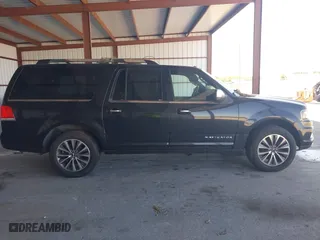 2015 Lincoln Navigator L with VIN 5LMJJ3JT0FEJ12569, listed as a IAAI auction lot 41909517 with 165,631 mi miles. Bid and sale history available at carsss.com. Image 12.
