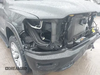 2021 Ram 1500 Laramie with VIN 1C6SRFJT6MN580803, listed as a IAAI auction lot 41207914 with 56,891 mi miles and . Bid and sale history available at DreamBid. Image 19.