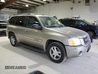 2003 GMC Envoy SLE z VIN 1GKDT13S432136642, wystawiony jako Copart lot #53467095 z przebiegiem 98 832 mil mil oraz Szkoda całkowita • Salvage title. Historia ofert i sprzedaży dostępna na DreamBid. Obrazek 4.