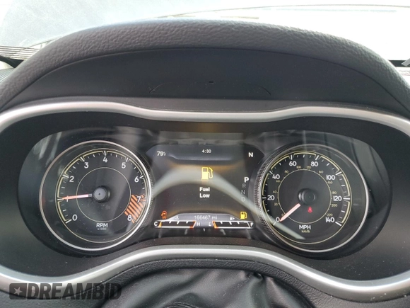 2014 Jeep Cherokee Trailhawk with VIN 1C4PJMBS4EW187085, listed as a Copart auction lot 64106985 with 166,467 mi miles and Clean title. Bid and sale history available at DreamBid. Image 9.