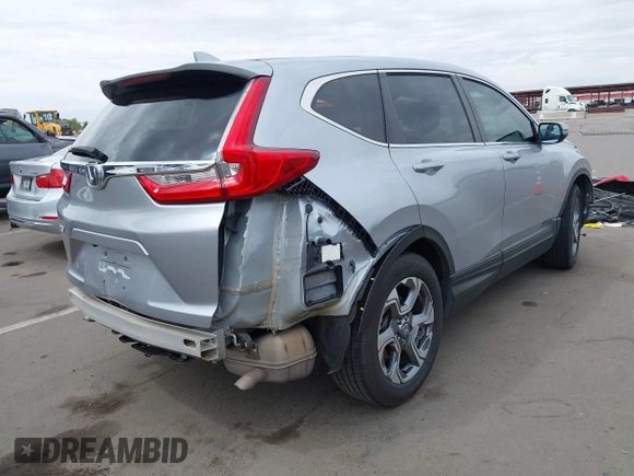 2018 Honda CR-V EX with VIN 5J6RW1H51JA003796, listed as a IAAI auction lot 41885166 with 121,561 mi miles. Bid and sale history available at carsss.com. Image 4.