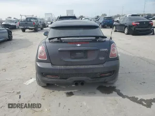 2014 MINI Coupe S z VIN WMWSX3C59ET773064, wystawiony jako Copart lot #42989015 z przebiegiem 135 005 mil mil oraz Szkoda całkowita • Salvage title. Historia ofert i sprzedaży dostępna na DreamBid. Obrazek 6.