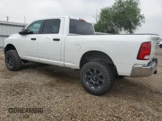 2014 Ram 2500 Tradesman z VIN 3C6UR5CLXEG253721, wystawiony jako Copart lot #51268065 z przebiegiem 157 904 mil mil oraz Szkoda całkowita • Salvage title. Historia ofert i sprzedaży dostępna na DreamBid. Obrazek 2.