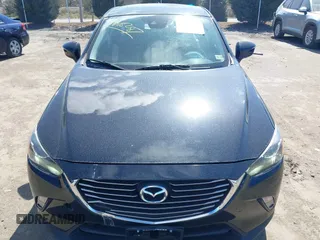 2018 Mazda CX-3 Grand Touring z VIN JM1DKFD75J0312662, wystawiony jako IAAI lot #41805287 z przebiegiem 140 083 mil mil oraz . Historia ofert i sprzedaży dostępna na DreamBid. Obrazek 12.