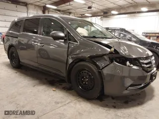 2015 Honda Odyssey EX with VIN 5FNRL5H45FB008236, listed as a IAAI auction lot 41830349 with 148,792 mi miles. Bid and sale history available at carsss.com. Image 1.