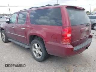 2011 Chevrolet Suburban LT with VIN 1GNSCJE0XBR355603, listed as a IAAI auction lot 42555932 with 240,213 mi miles and . Bid and sale history available at DreamBid. Image 3.