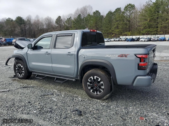 2024 Nissan Frontier PRO-4X with VIN 1N6ED1EK8RN659581, listed as a Copart auction lot 44911715 with 6,215 mi miles and Salvage Title. Bid and sale history available at carsss.com. Image 2.