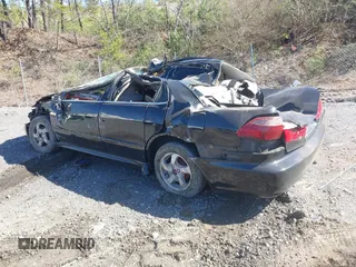 2002 Honda Accord LX with VIN 1HGCG56422A010978, listed as a IAAI auction lot 41639059 with 386,221 mi miles and . Bid and sale history available at DreamBid. Image 3.