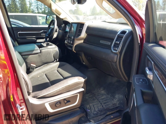2019 Ram 1500 Laramie with VIN 1C6SRFJT2KN677400, listed as a IAAI auction lot 42441010 with 76,750 mi miles and . Bid and sale history available at DreamBid. Image 5.