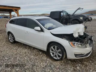 2016 Volvo V60 T5 Drive-E Premier z VIN YV140MEK3G1316185, wystawiony jako Copart lot #49115635 z przebiegiem 76 199 mil mil oraz Szkody całkowita. Historia ofert i sprzedaży dostępna na DreamBid. Obrazek 4.