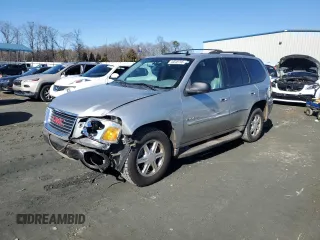 2006 GMC Envoy SLT with VIN 1GKDS13S362362176, listed as a Copart auction lot 43038795 with 180,279 mi miles and Salvage Title. Bid and sale history available at carsss.com. Image 1.