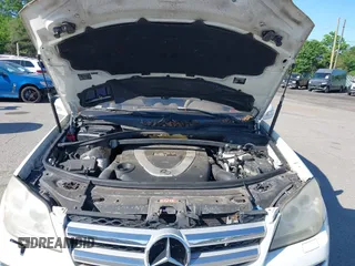 2007 Mercedes-Benz GL 450 z VIN 4JGBF71E57A153984, wystawiony jako IAAI lot #42291789 z przebiegiem 169 406 mil mil oraz . Historia ofert i sprzedaży dostępna na DreamBid. Obrazek 10.