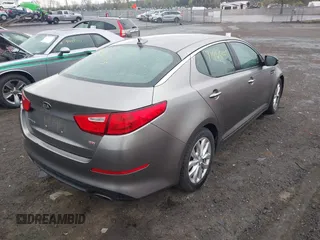 2015 Kia Optima LX with VIN 5XXGM4A76FG475908, listed as a IAAI auction lot 41964205 with 122,965 mi miles. Bid and sale history available at carsss.com. Image 4.