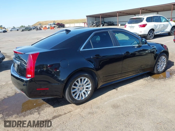 2013 Cadillac CTS Luxury with VIN 1G6DE5E51D0165634, listed as a IAAI auction lot 42208023 with 92,827 mi miles and . Bid and sale history available at DreamBid. Image 4.