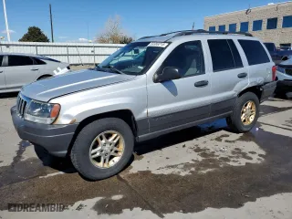 2003 Jeep Grand Cherokee Laredo with VIN 1J4GW48S13C556129, listed as a Copart auction lot 50389215 with 193,934 mi miles and Salvage Title. Bid and sale history available at carsss.com. Image 1.