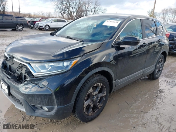 2018 Honda CR-V EX with VIN 7FARW2H57JE102324, listed as a IAAI auction lot 41469838 with 139,964 mi miles. Bid and sale history available at carsss.com. Image 2.