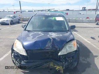 2007 Honda CR-V LX with VIN JHLRE38317C027258, listed as a IAAI auction lot 41766747 with 163,930 mi miles. Bid and sale history available at carsss.com. Image 13.