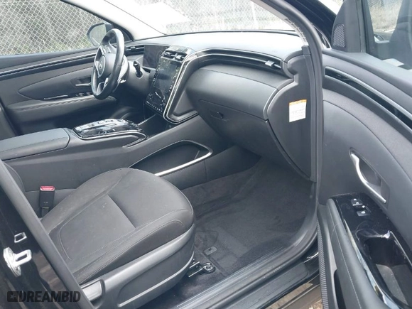 2022 Hyundai Tucson Hybrid SEL Convenience with VIN KM8JFCA15NU015911, listed as a IAAI auction lot 41875212 with 66,881 mi miles. Bid and sale history available at carsss.com. Image 5.