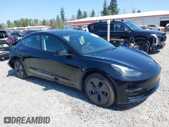 2022 Tesla Model 3 Long Range with VIN 5YJ3E1EB7NF241996, listed as a IAAI auction lot 42115915 with 23,433 mi miles and . Bid and sale history available at DreamBid. Image 1.