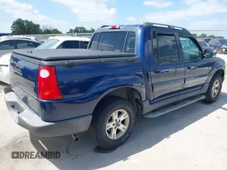 2005 Ford Explorer Sport Trac XLS z VIN 1FMZU67K05UB36386, wystawiony jako IAAI lot #42449876 z przebiegiem 161 181 mil mil oraz . Historia ofert i sprzedaży dostępna na DreamBid. Obrazek 4.