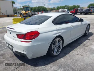 2014 BMW 6 Series 650i with VIN WBAYM9C55ED248244, listed as a IAAI auction lot 42043456 with 144,664 mi miles and . Bid and sale history available at DreamBid. Image 4.