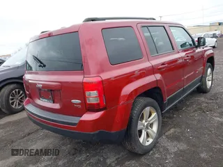 2014 Jeep Patriot Latitude with VIN 1C4NJRFB6ED892819, listed as a IAAI auction lot 42053389 with 92,213 mi miles and . Bid and sale history available at carsss.com. Image 4.