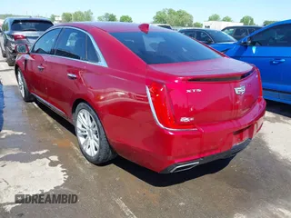 2019 Cadillac XTS Luxury z VIN 2G61M5S39K9118573, wystawiony jako IAAI lot #42014038 z przebiegiem 99 247 mil mil oraz . Historia ofert i sprzedaży dostępna na DreamBid. Obrazek 3.
