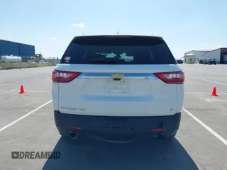 2018 Chevrolet Traverse LT z VIN 1GNEVHKW3JJ125861, wystawiony jako IAAI lot #41876184 z przebiegiem 95 223 mil mil oraz . Historia ofert i sprzedaży dostępna na DreamBid. Obrazek 16.