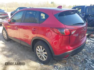 2015 Mazda CX-5 Touring with VIN JM3KE4CY1F0510361, listed as a IAAI auction lot 42134415 with 95,907 mi miles and . Bid and sale history available at carsss.com. Image 3.