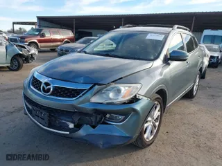 2011 Mazda CX-9 Grand Touring with VIN JM3TB3DV9B0310575, listed as a IAAI auction lot 41313813 with 146,915 mi miles. Bid and sale history available at carsss.com. Image 6.