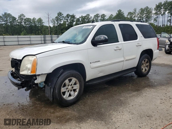 2009 GMC Yukon SLT w/4SA with VIN 1GKFC33J59R178362, listed as a Copart auction lot 69698034 with 321,104 mi miles and Salvage Title. Bid and sale history available at carsss.com. Image 1.