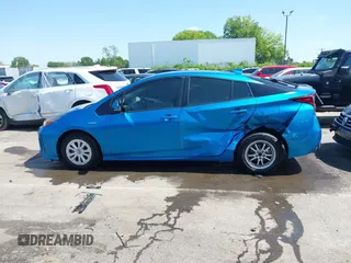 2020 Toyota Prius L Eco with VIN JTDKARFUXL3118354, listed as a IAAI auction lot 41991337 with 83,030 mi miles and . Bid and sale history available at DreamBid. Image 14.
