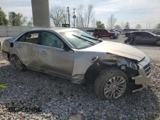 2014 Cadillac CTS Luxury AWD с VIN 1G6AX5S34E0180551, выставлен на аукционе Copart как лот 55983015 с пробегом Не указан миль и Списание • Salvage title. История ставок и продаж доступна на DreamBid. Изображение 4.