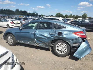 2013 Honda Crosstour EX z VIN 5J6TF3H33DL005641, wystawiony jako Copart lot #70750994 z przebiegiem 256 821 mil mil oraz Szkoda całkowita • Salvage title. Historia ofert i sprzedaży dostępna na DreamBid. Obrazek 2.