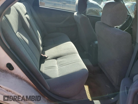 2000 Toyota Camry CE z VIN JT2BG28K8Y0467211, wystawiony jako Copart lot #55478835 z przebiegiem Nie podano mil oraz Szkoda całkowita • Salvage title. Historia ofert i sprzedaży dostępna na DreamBid. Obrazek 10.