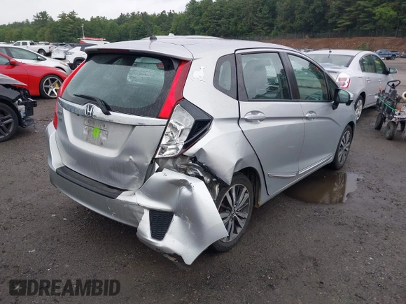 2015 Honda Fit EX-L z VIN 3HGGK5H82FM713988, wystawiony jako IAAI lot #42517762 z przebiegiem 56 169 mil mil oraz . Historia ofert i sprzedaży dostępna na DreamBid. Obrazek 4.