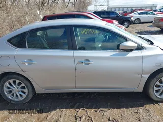 2019 Nissan Sentra S z VIN 3N1AB7APXKY372220, wystawiony jako IAAI lot #41723914 z przebiegiem 103 308 mil mil oraz . Historia ofert i sprzedaży dostępna na DreamBid. Obrazek 13.
