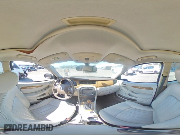 2008 Jaguar X-Type z VIN SAJWA51A38WJ36788, wystawiony jako Copart lot #73103604 z przebiegiem 192 416 mil mil oraz Szkoda całkowita • Salvage title. Historia ofert i sprzedaży dostępna na DreamBid. Obrazek 13.
