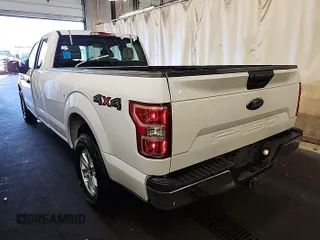 2019 Ford F-150 XL with VIN 1FTEX1E55KKC02870, listed as a IAAI auction lot 42737712 with 206,967 mi miles and . Bid and sale history available at DreamBid. Image 28.