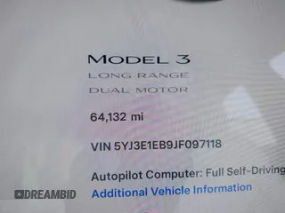 2018 Tesla Model 3 Long Range Battery with VIN 5YJ3E1EB9JF097118, listed as a IAAI auction lot 41619510 with 64,132 mi miles and . Bid and sale history available at DreamBid. Image 7.
