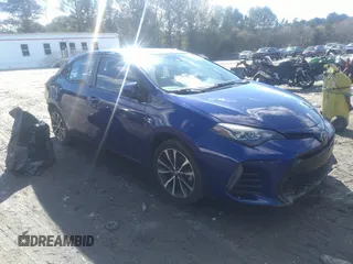 2019 Toyota Corolla L z VIN 5YFBURHE2KP893637, wystawiony jako IAAI lot #40920471 z przebiegiem 210 000 mil mil oraz . Historia ofert i sprzedaży dostępna na DreamBid. Obrazek 1.
