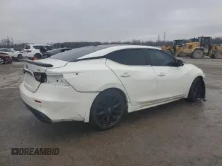 2019 Nissan Maxima Platinum z VIN 1N4AA6AV5KC373153, wystawiony jako Copart lot #43813565 z przebiegiem 106 698 mil mil oraz Szkody całkowita. Historia ofert i sprzedaży dostępna na DreamBid. Obrazek 3.