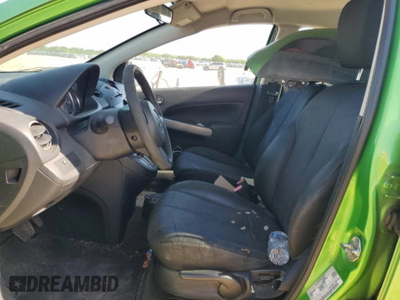 2013 Mazda Mazda2 Sport with VIN JM1DE1KY0D0157951, listed as a Copart auction lot 53934215 with 187,534 mi miles and Salvage Title. Bid and sale history available at carsss.com. Image 7.