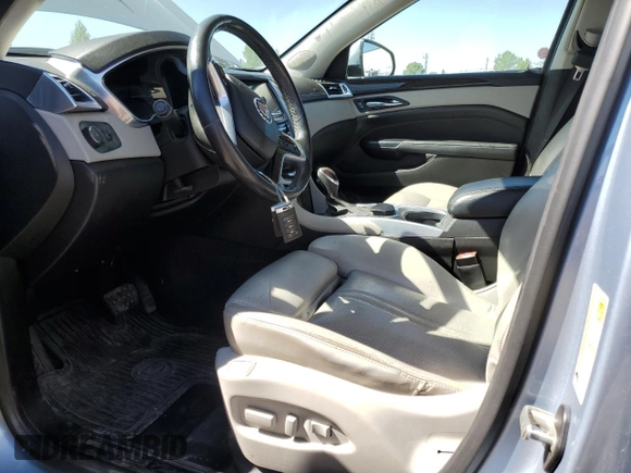2013 Cadillac SRX Premium Collection with VIN 3GYFNJE31DS555908, listed as a Copart auction lot 58870495 with 170,880 mi miles and Clean title. Bid and sale history available at DreamBid. Image 7.