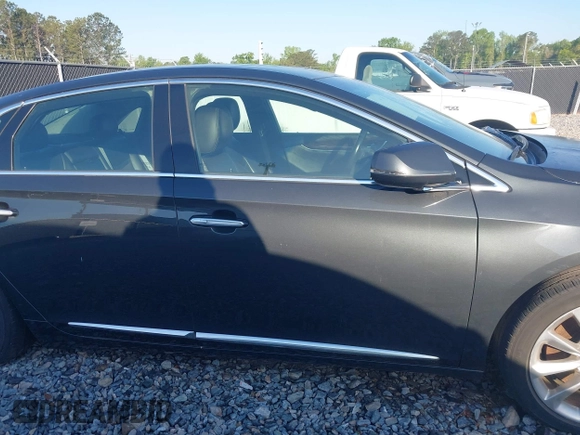 2013 Cadillac XTS Luxury with VIN 2G61P5S3XD9141306, listed as a IAAI auction lot 42034077 with 120,294 mi miles. Bid and sale history available at carsss.com. Image 13.