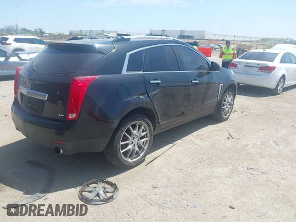 2013 Cadillac SRX Premium Collection with VIN 3GYFNJE33DS560639, listed as a IAAI auction lot 42015863 with 161,270 mi miles and . Bid and sale history available at DreamBid. Image 4.