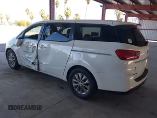 2021 Kia Sedona LX with VIN KNDMB5C15M6669588, listed as a IAAI auction lot 41757129 with 14,738 mi miles. Bid and sale history available at carsss.com. Image 3.