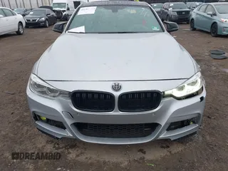 2018 BMW 3 Series 330i xDrive with VIN WBA8D9C55JA607605, listed as a IAAI auction lot 41682994 with 79,285 mi miles and . Bid and sale history available at DreamBid. Image 12.
